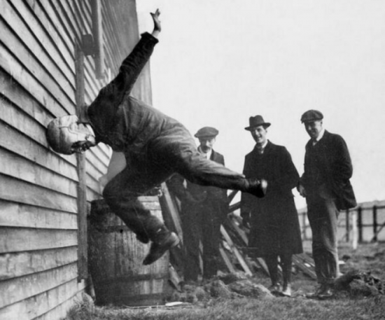 Crazy photo of dude testing a football helmet in 1912