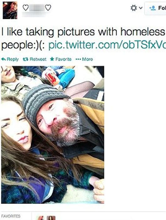 People posing with homeless people 010