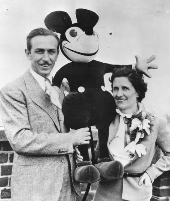 Walt & Lillian Disney with a creepy Mickey stuffed animal in 1935