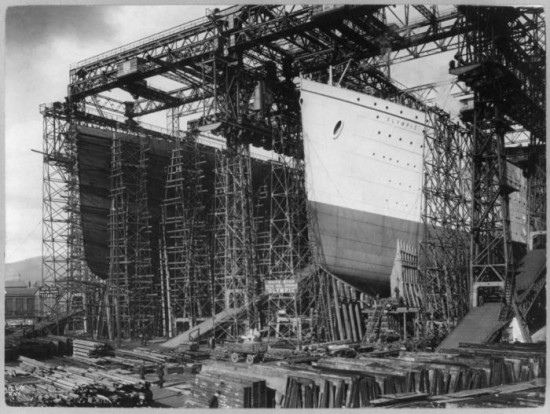 Olympic and Titanic, under construction, side by side. Belfast 1910