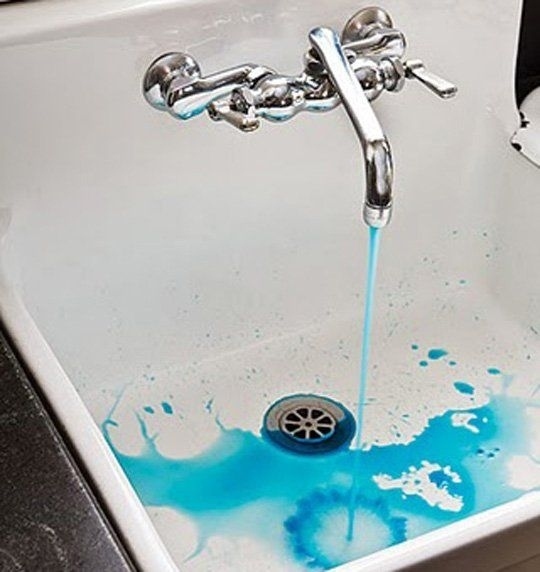 Put a few dye pellets under the cap of your faucet