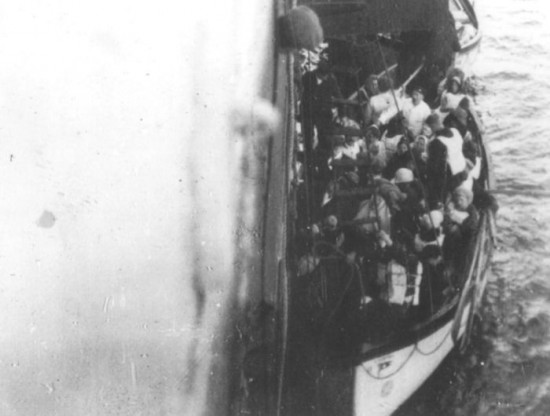 Titanic lifeboat next to the Carpathia. April 15, 1912