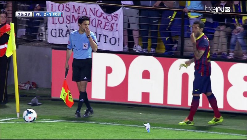 soccer player eating a banana
