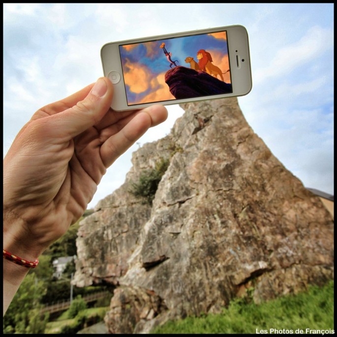 Movie and TV scenes on an iPhone held up in front of perfect real-life backgrounds 001